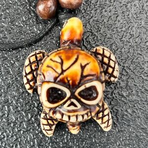 Hand carved turtle necklaces